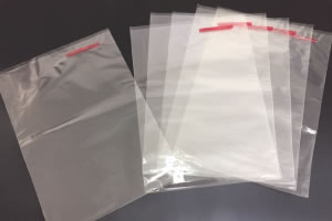 With a bag closure tape