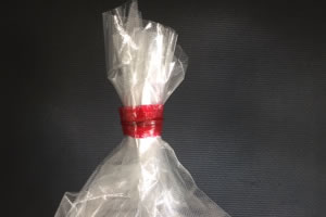 With a bag closure tape